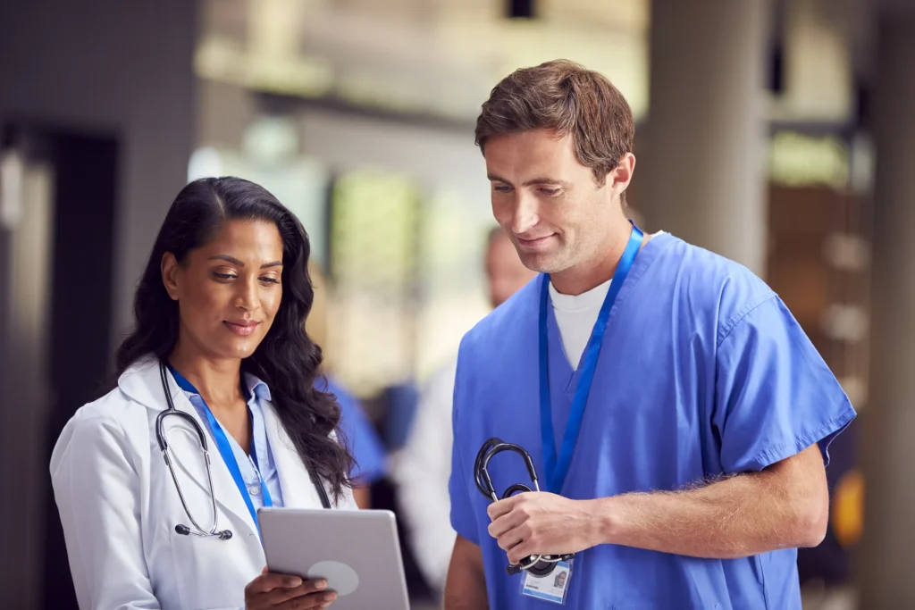 Doctors discussing patient care plan during IVF Treatment in Ahmedabad
